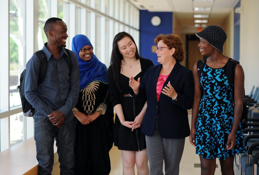 Debbie Goettel with college students