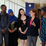 Debbie Goettel with college students